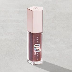NEW IN BOX FENTY BEAUTY GLOSS BOMB OIL LUMINIZING LIP OIL GLOSS IN ROSE AMBER
